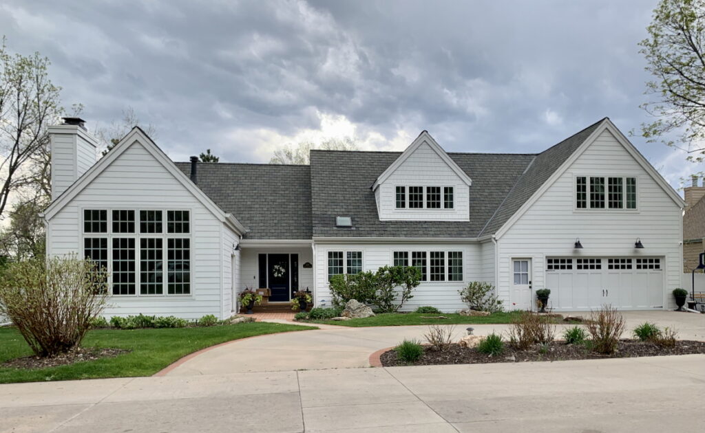 A home features a SW Snowbound exterior paint color palette.