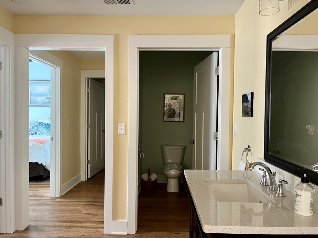 A hallway painted with BM Cornsilk paint.