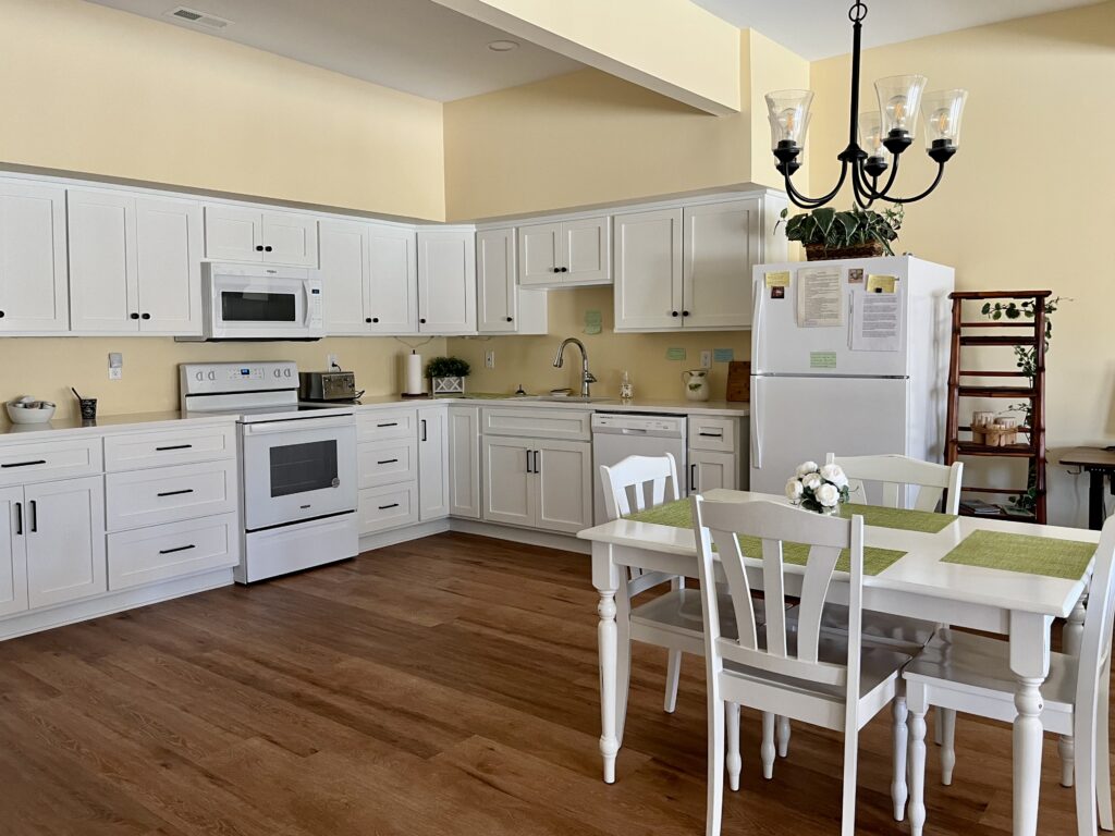 A kitchen is painted with Benjamin Moore Cornsilk paint. 