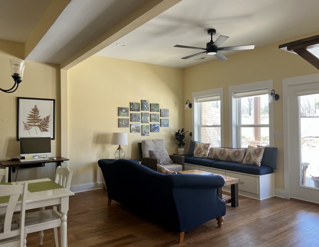 A living room painted with BM Cornsilk paint. 
