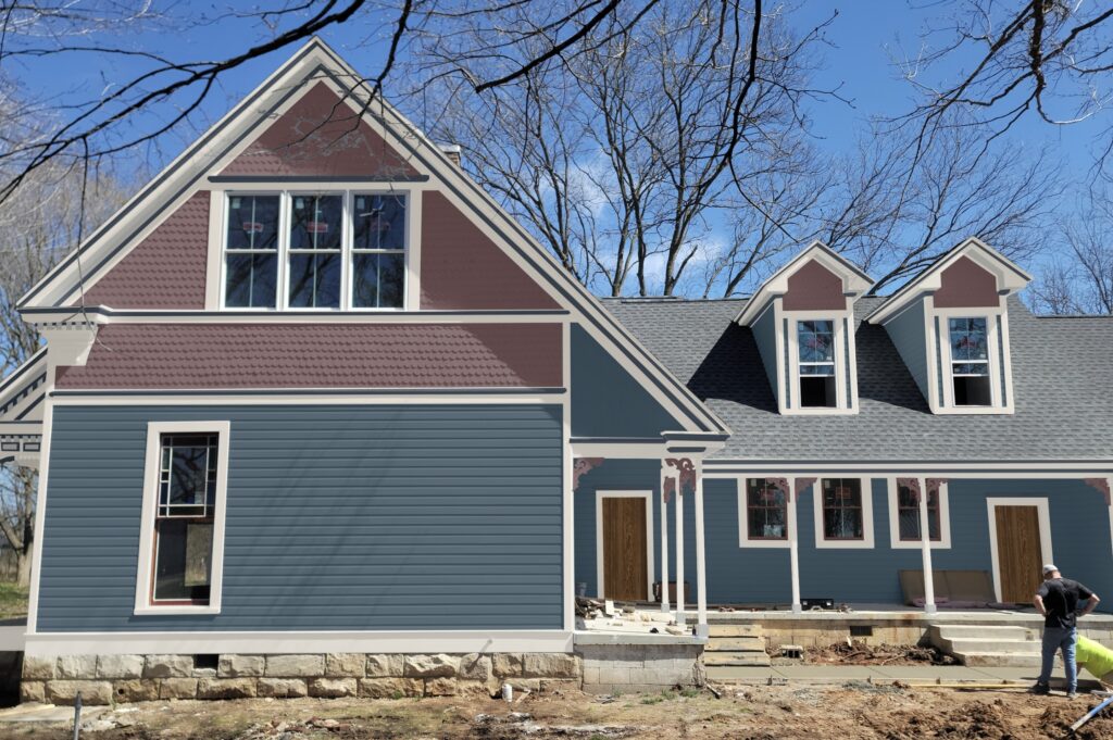 A rendering of our favorite Victorian farmhouse exterior paint colors in a color scheme. 