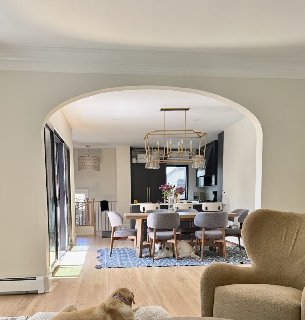 An open concept dining room with SW Shoji White walls.
