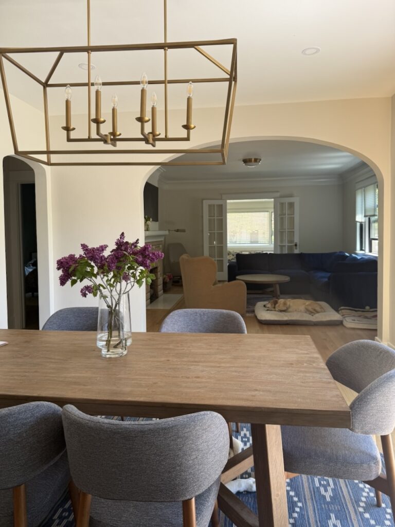 An open concept dining room with SW Shoji White walls.