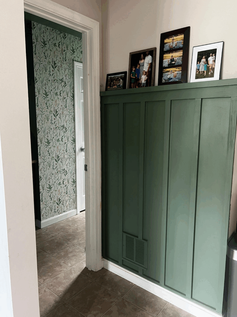 A board and batten accent wall with Benjamin Moore Pinelands paint