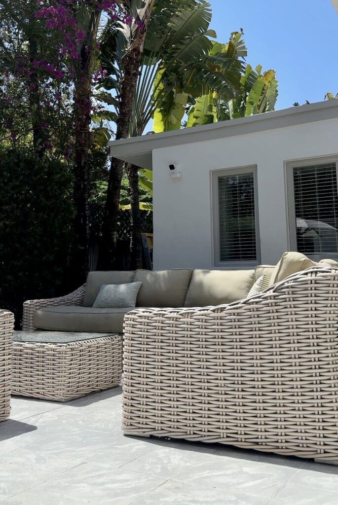 A home features Sherwin-Williams Origami White exterior paint with Sherwin-Williams Mindful Gray exterior trim.