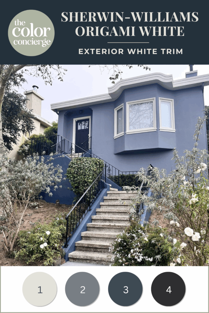 A home features a moody blue color palette with SW Sea Serpent exterior paint and Sherwin-Williams Origami White exterior trim.