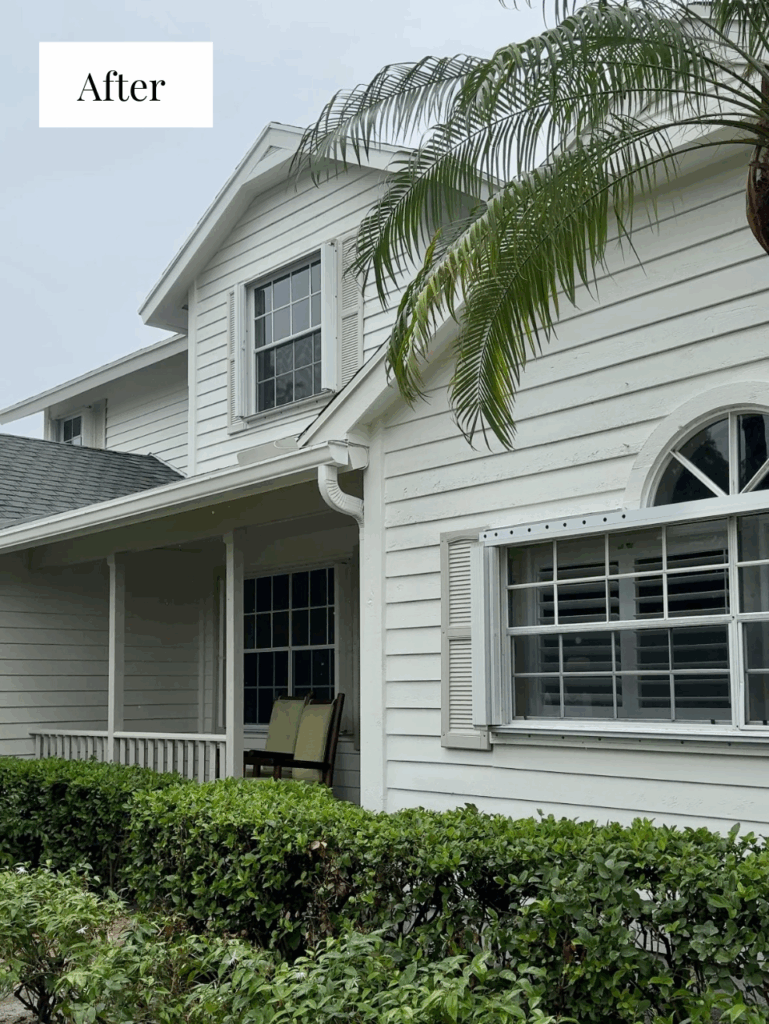 A Florida home features a BM Swiss Coffee exterior color palette with Revere Pewter trim. 