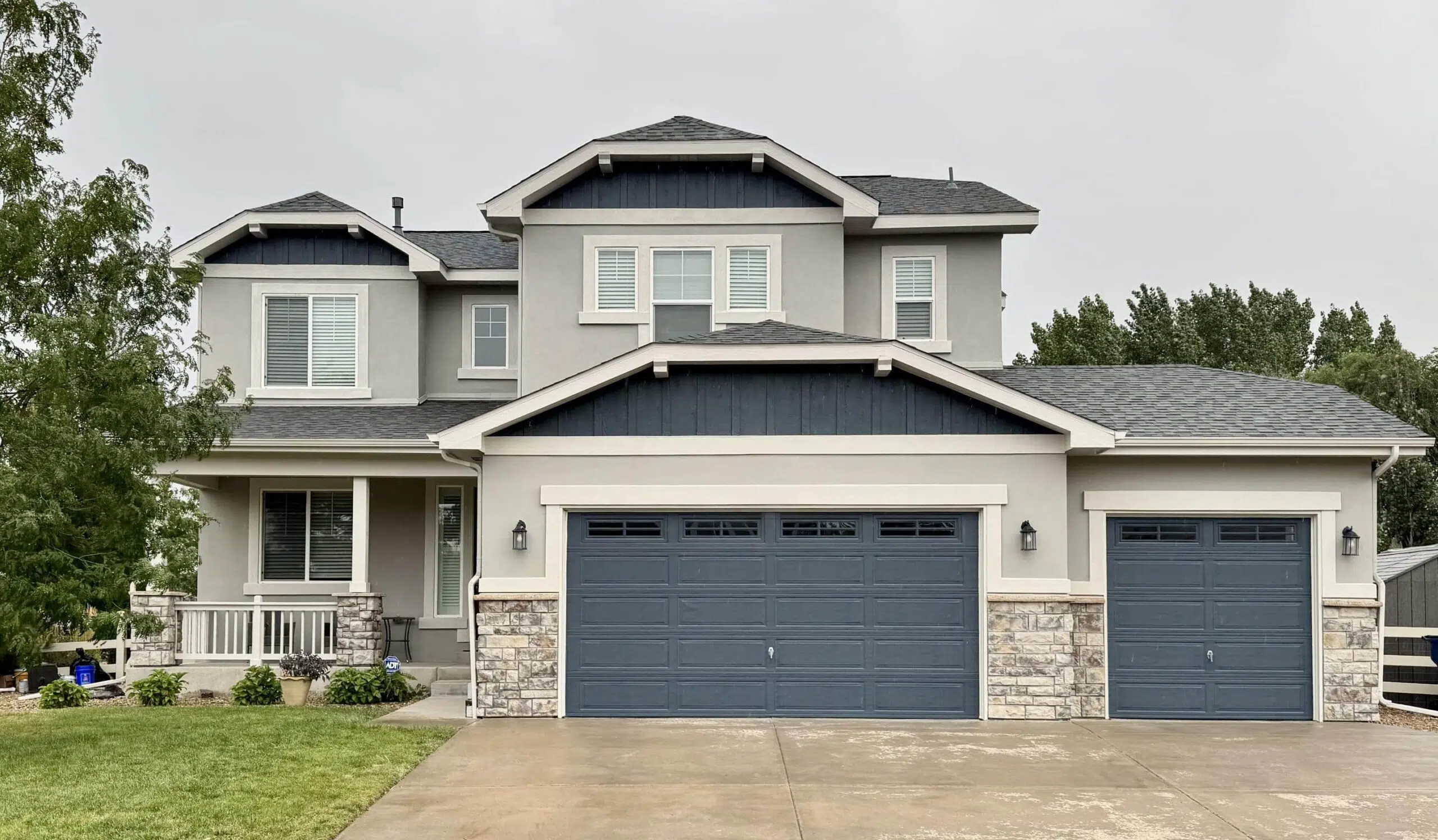 Garage doors painted with SW Sea Serpent paint.