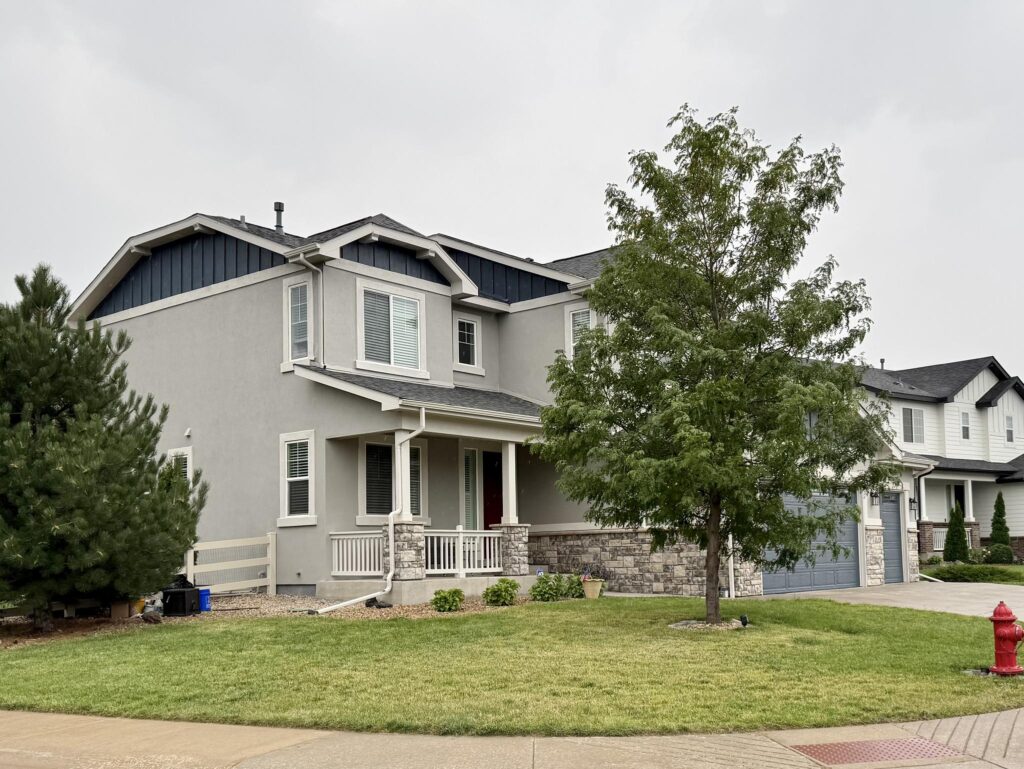 An exterior paint color palette featuring SW Dorian Gray paint.