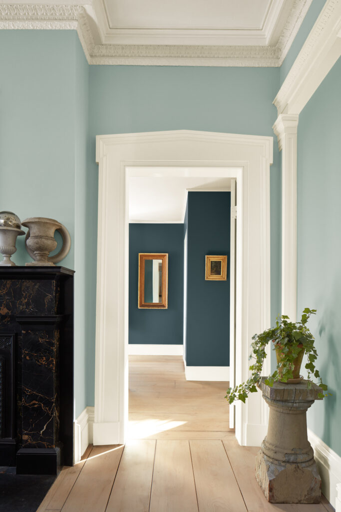 A hallway painted with BM Raindance, one of the 2026 Color Trend paint colors.