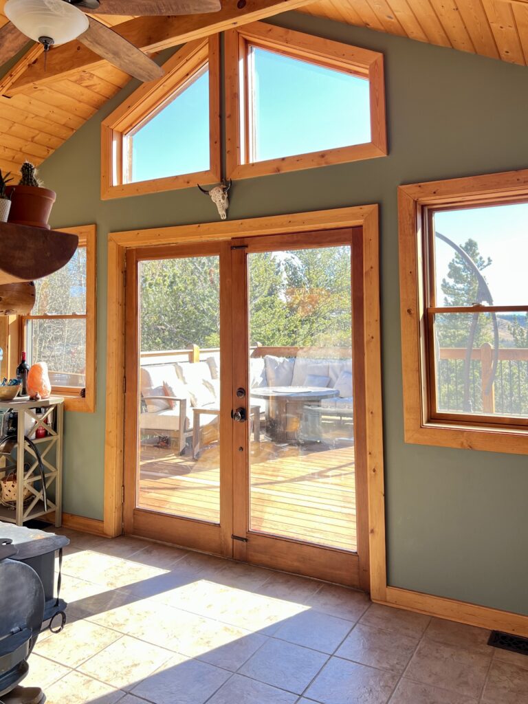 An entryway painted with BM Cambridge Green wall paint.