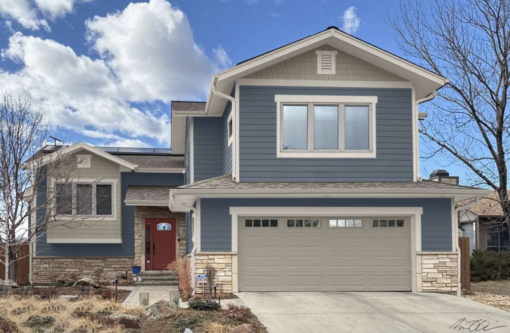 A photoshop rendering of a home painted with SW Granite Peak exterior paint.