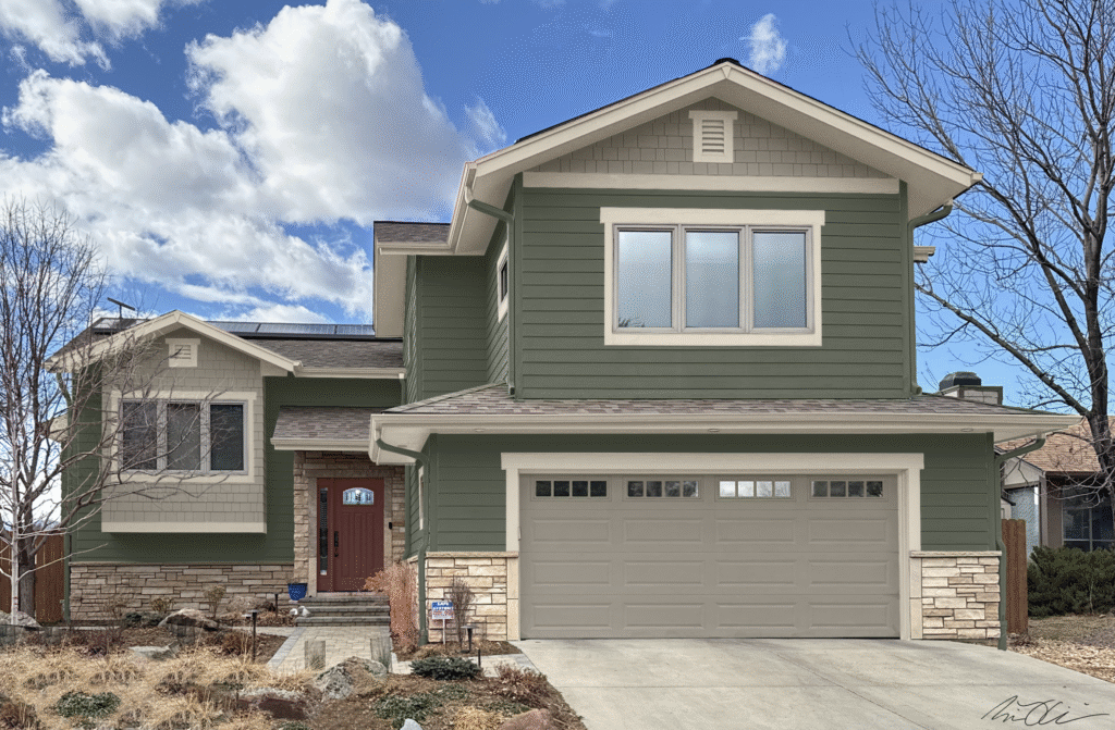 A photoshop rendering of a home painted with SW Rosemary exterior paint.