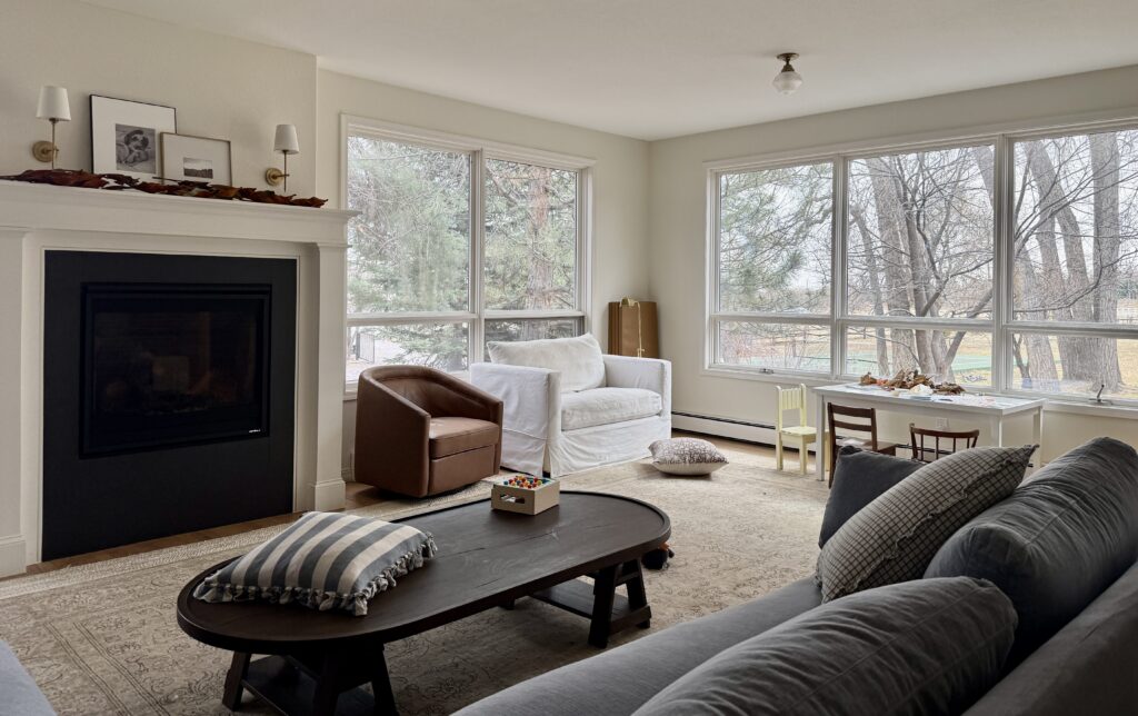 A living room is painted with Sherwin-Williams Creamy off-white paint.