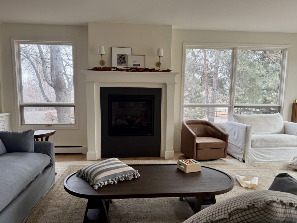 A living room is painted with SW Creamy walls.