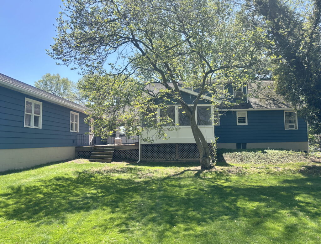 A SW Waterloo exterior paint color palette with SW Pearly White trim.