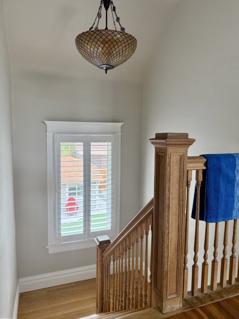 A stairway painted with BM Pale Oak, the foundation of our Pale Oak color palette