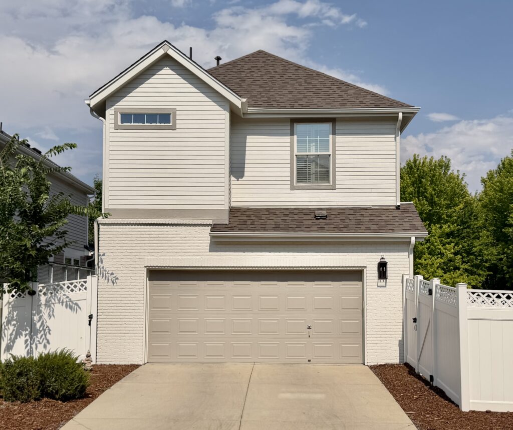 Garage doors are painted with SW Mega Greige paint.