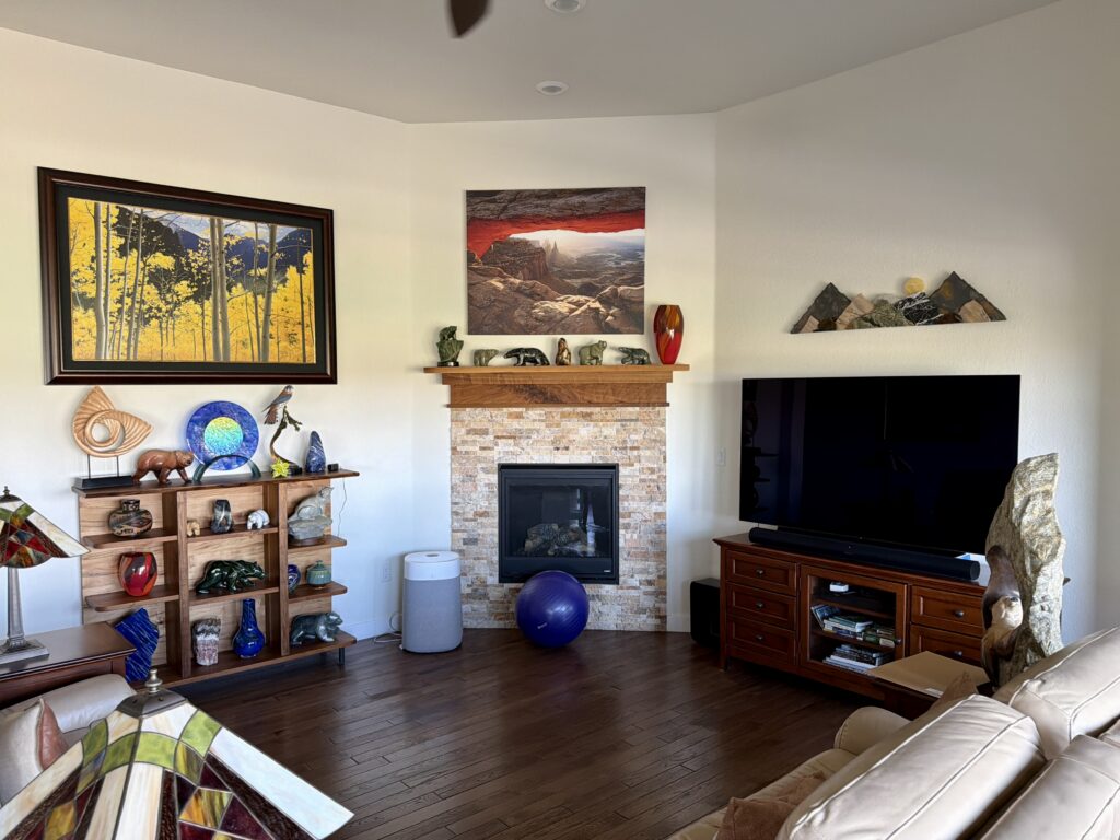 A Denver ranch home with Sherwin-Williams Dover White walls, reflecting the greenery outside