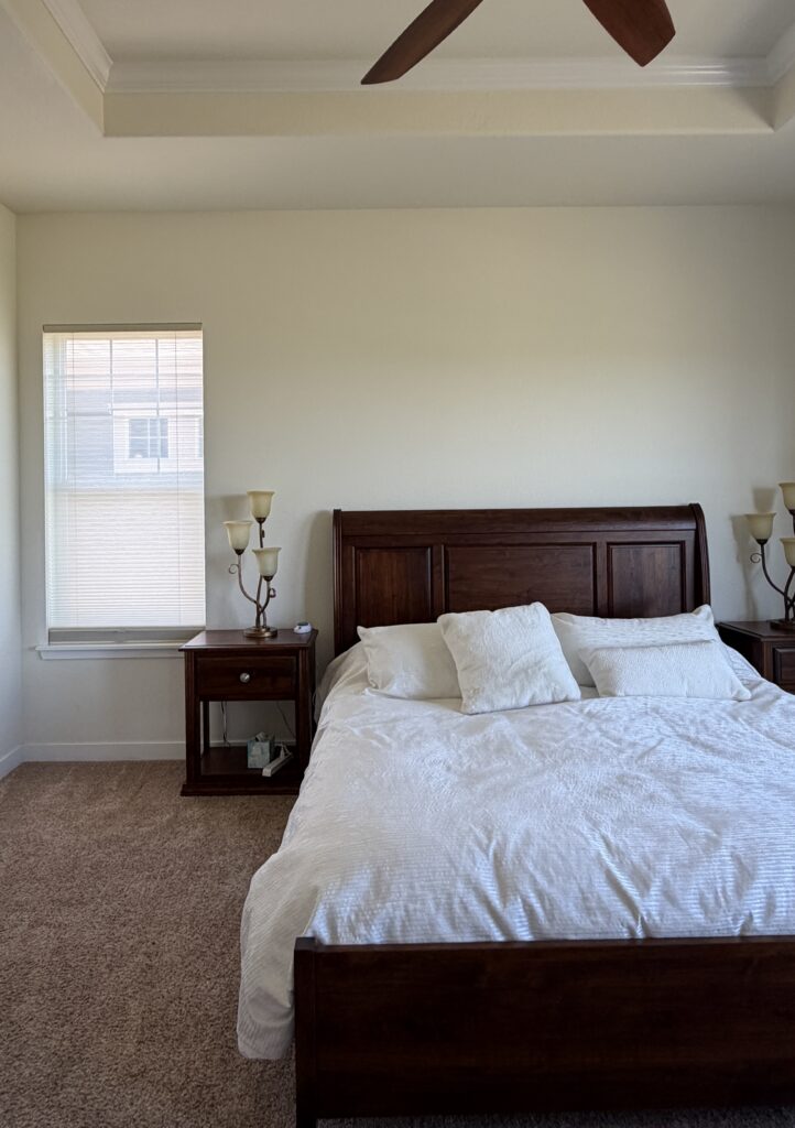 A bedroom features SW Dover White walls and SW Pure White trim.