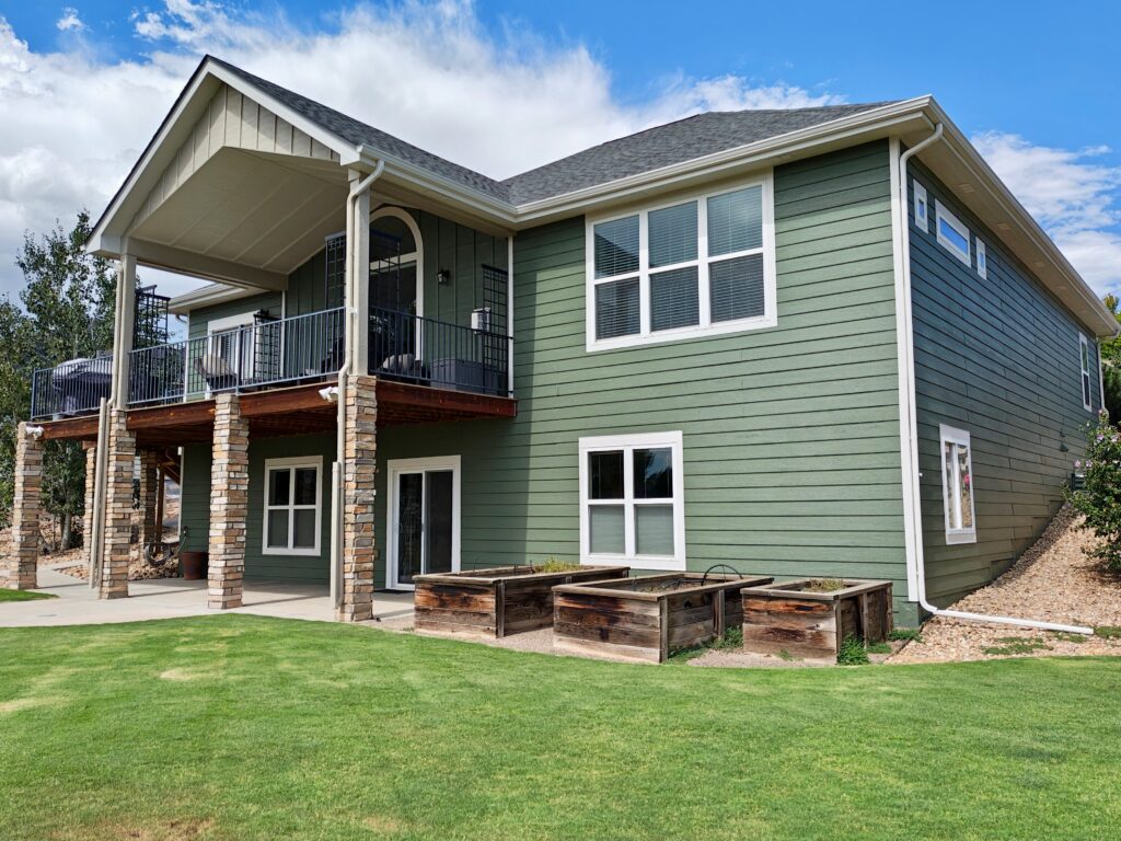 Home with Rosemary siding, Egret White trim, and Taupe Tone accents