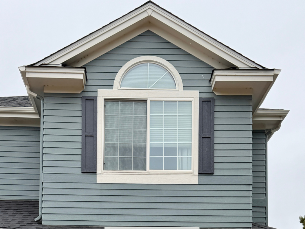An exterior color palette with Sherwin-Williams Pearly White exterior trim and window trim.