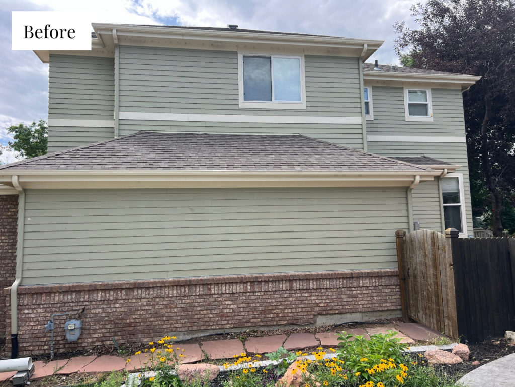 before photo of pale green siding with white racing stripe trim